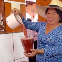 Saida del Caucau II serving Chicha de Arequipa